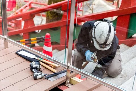 Handyman Fixing Something with Tools Stock Photos
