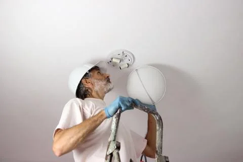 Handyman lamp mount Stock Photos
