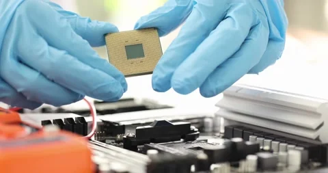 Handyman in rubber gloves installing computer processor closeup 4k movie slow Stock Footage 164408976