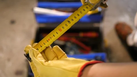 Handyman worker checking measuring size Tape Meter tool device. Toolbox. 動画素材 126330610