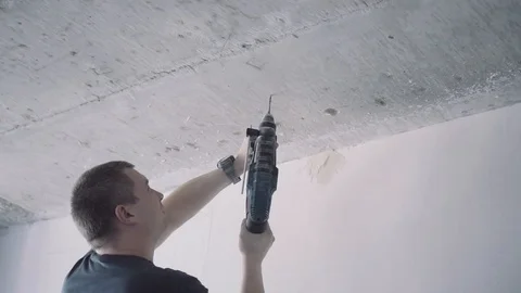 Handyman is working with a drill Vídeo Stock 102228528