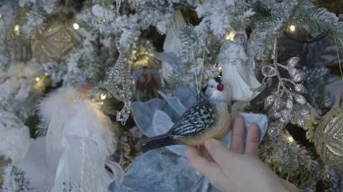 Hang Christmas Decorations on the Tree Stock Footage 295600663