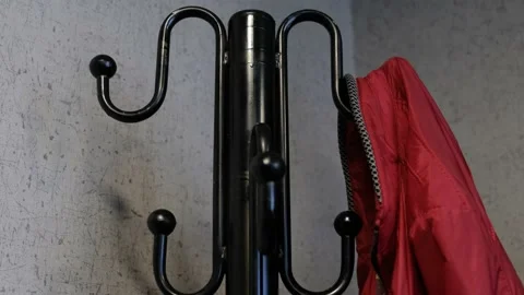 Hang a coat on the hanger 動画素材 195302665