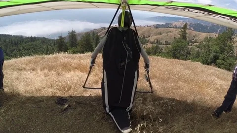 Hang Glider launching on hillside in Big Sur Stock-Footage 76676022