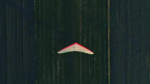 Hang glider preparing for takeoff on the grass runway Stock Footage 160375531