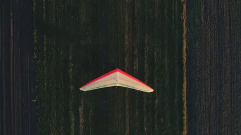 Hang glider preparing for takeoff on the grass runway Stock Footage 160375711