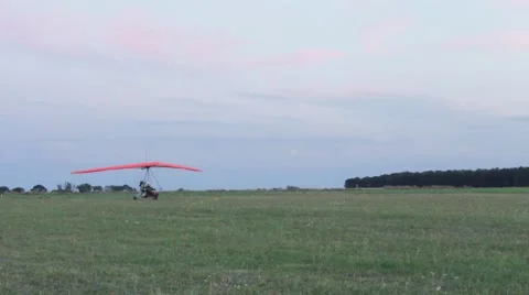 Hang glider start to fly Stock Footage 54960338