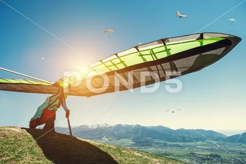Hang-glider starting to fly Stock Photos