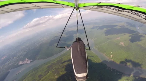 Hang Glider Turning Over Forest, River, and Lake Stock-Footage 62473899