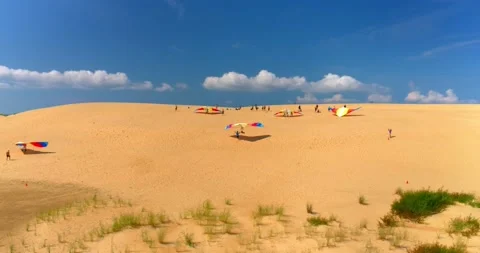 Hang Gliding on Sand Dunes in Outer Banks, Aerial Drone Shot 4K Stock Footage 141599983