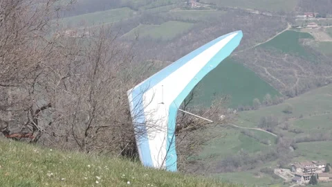 Hang gliding stuck in trees take off accident extreme sports aerial view 動画素材 153551658