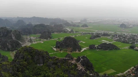 Hang Mua Temple & Rice field Stock Footage
