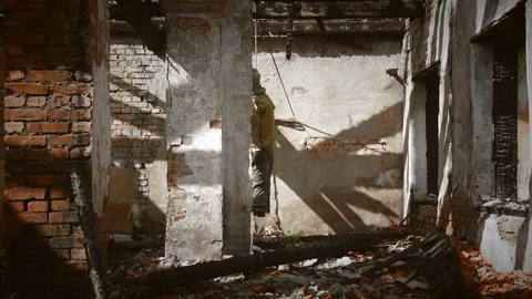 Hanged man in a burnt house, camera move from left to right Stock Footage 78039229
