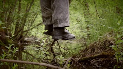 Hanged man over the swamp, camera move from right to left Stock Footage 77485894