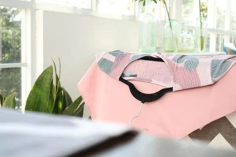 Hanger Clothes With cleaning the window Stock Photos