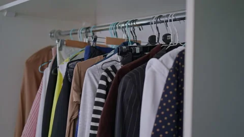 Hangers with clothes Stock Footage 228593277