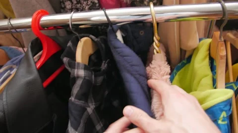 Hangers Clothes In Second Hand Video stock 151801078
