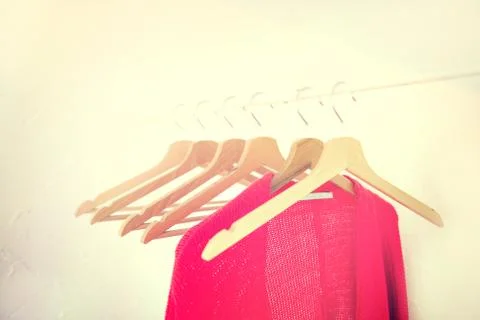 Hangers on the rack placed sort of chaotically Stock Photos