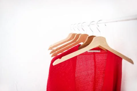 Hangers on the rack placed sort of chaotically Stock Photos