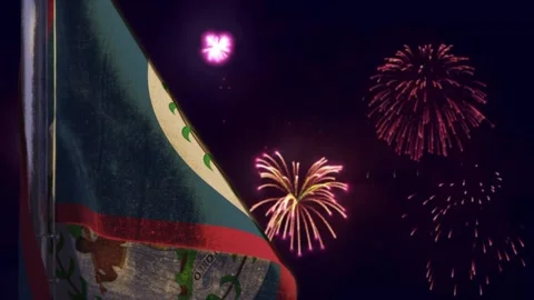 Hanging Belize flag on firework sky bokeh bg Stock Footage 247136460