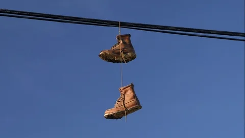 Hanging Boots Stock Footage 88102322