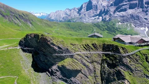 Hanging bridge Dangerously built on a cliff with steep fall Stock Footage 246984031