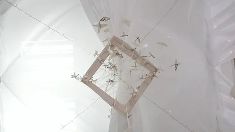 Hanging from the ceiling and flying golden hearts Stock Footage 102274739