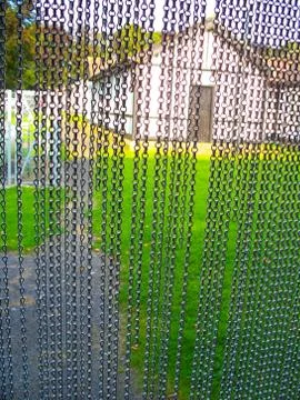Hanging Chain Fly Screen Stock Photos