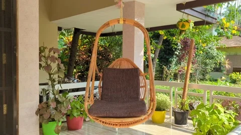 A hanging chair swing Stock Footage 232744618