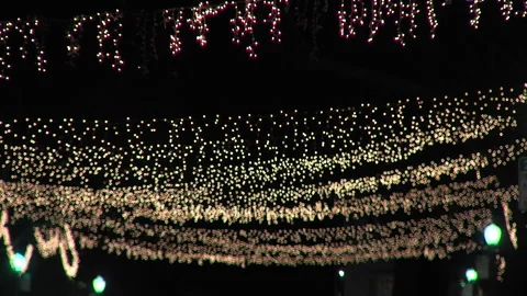 Hanging Christmas Lights Rack Focus Stock Footage 202616281