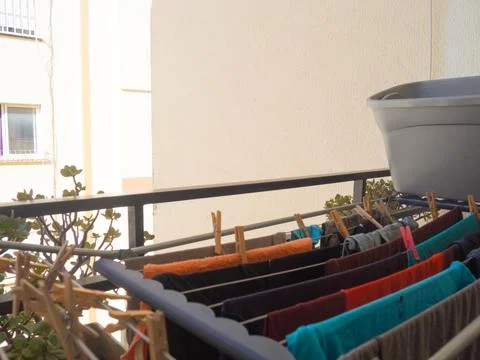 Hanging clothes on the balcony Foto stock