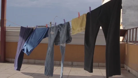 Hanging clothes Stock Footage 129841159