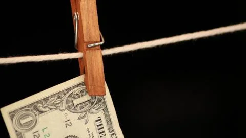 Hanging from the clothesline close Stock Photos
