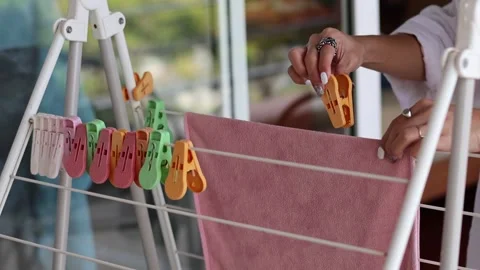 Hanging Clothespins on Drying Rack Vídeos de archivo 276457307
