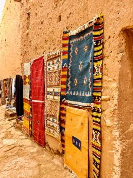 Hanging colored carpets Stock Photos
