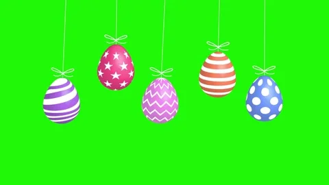 Hanging colorful easter eggs on green screen. Happy easter concept. Stock Footage 311238247