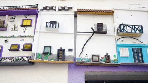 Hanging Decorations Colourful Models Of Front Of Houses In Old Town 스톡 동영상 254830639