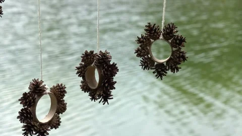 Hanging decorations made from natural elements by the water Stock Footage 339500854