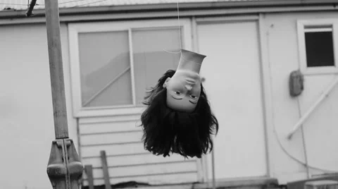 Hanging doll head Stock Footage 63900390