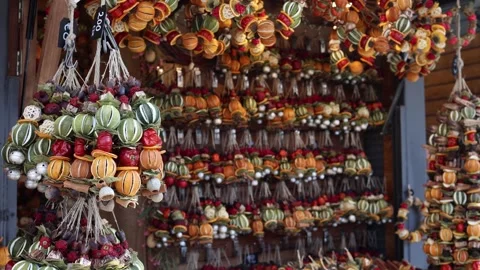 Hanging dried fruit decorations rustic market display Stock Footage 331812132