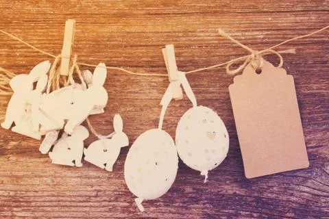 Hanging easter eggs and rabbits Stock Photos