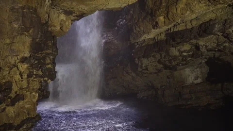 Hanging falls cascading over a rocky cliff Stock Footage 108740955