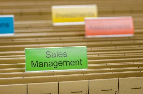 Hanging file folder labeled with Sales Management Hanging file folder labe... Stock Photos