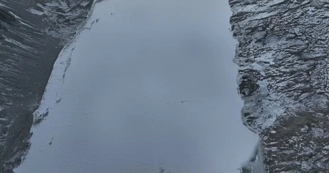 Hanging glacier and snow capped mountain with lake in Tibet, China Video stock 309525038