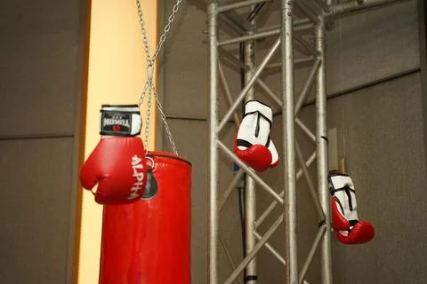 Hanging gloves on truss Stock Photos