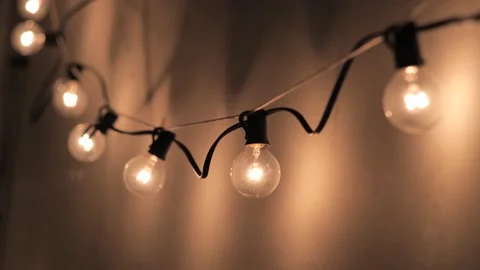 Hanging Indoor String Light Decoration Medium Hand Held Stock Footage 173165531