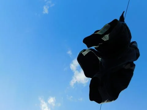 A hanging jacket on a wire Fotos Stock