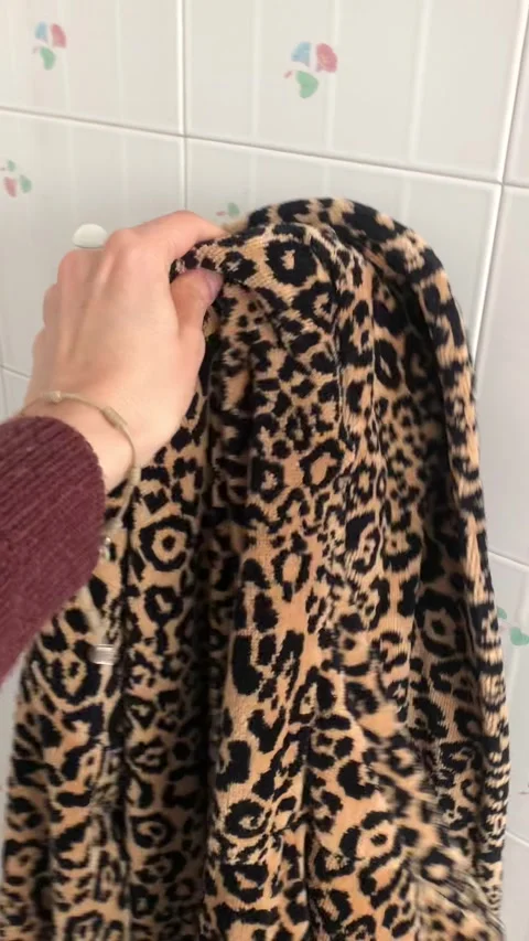 Hanging Leopard-printed Bathrobe In Bathroom Motion Close-Up Stock-Footage 333582517