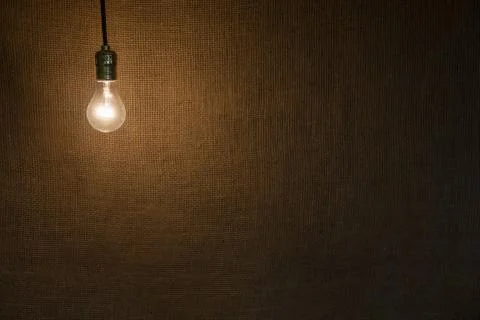 Hanging lightbulb background Stock Photos