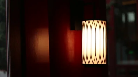 Hanging lighting glass foreground focus light bulb electricity lantern Stock Footage 233684424
